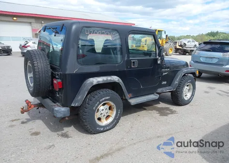 2002 Jeep Wrangler Sport z USA, uszkodzony, nr VIN 1J4FA49S82P704731